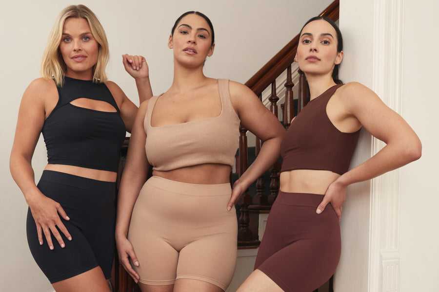 Three women wearing Thigh Society shorties
