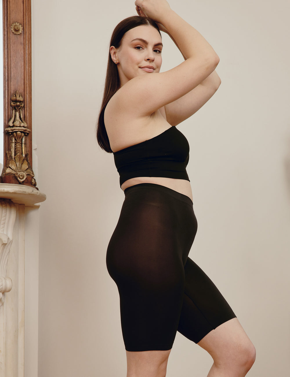 Kate is wearing The Cooling in M/L